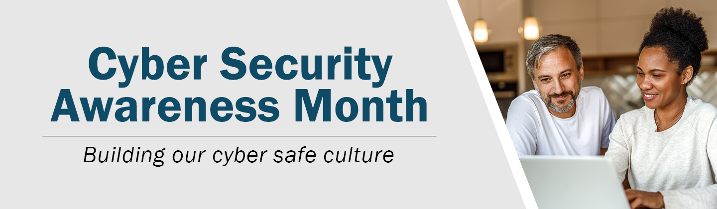 Banner with blue text on grey background "Cyber Security Awareness Month - Building our cyber safe culture" on the left. On the right is a man and woman sitting at a table looking at a laptop screen.